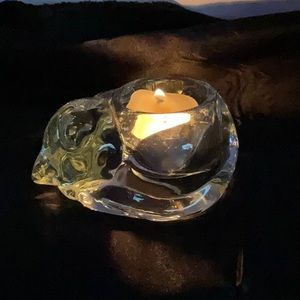 Indiana glass sleeping cat votive holder.